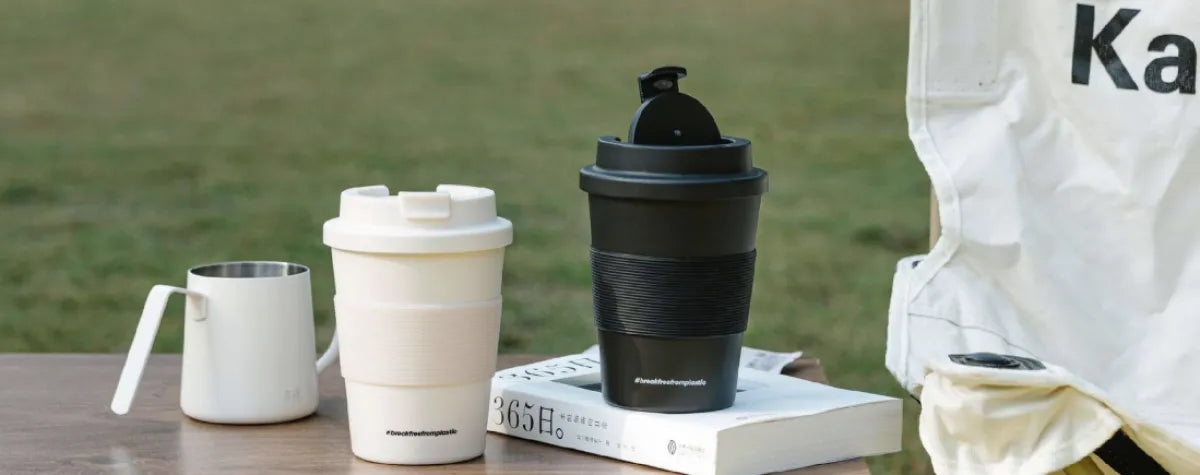 Reusable coffee cups and canvas tote bag, sustainable eco-friendly merch by Wumble Merch