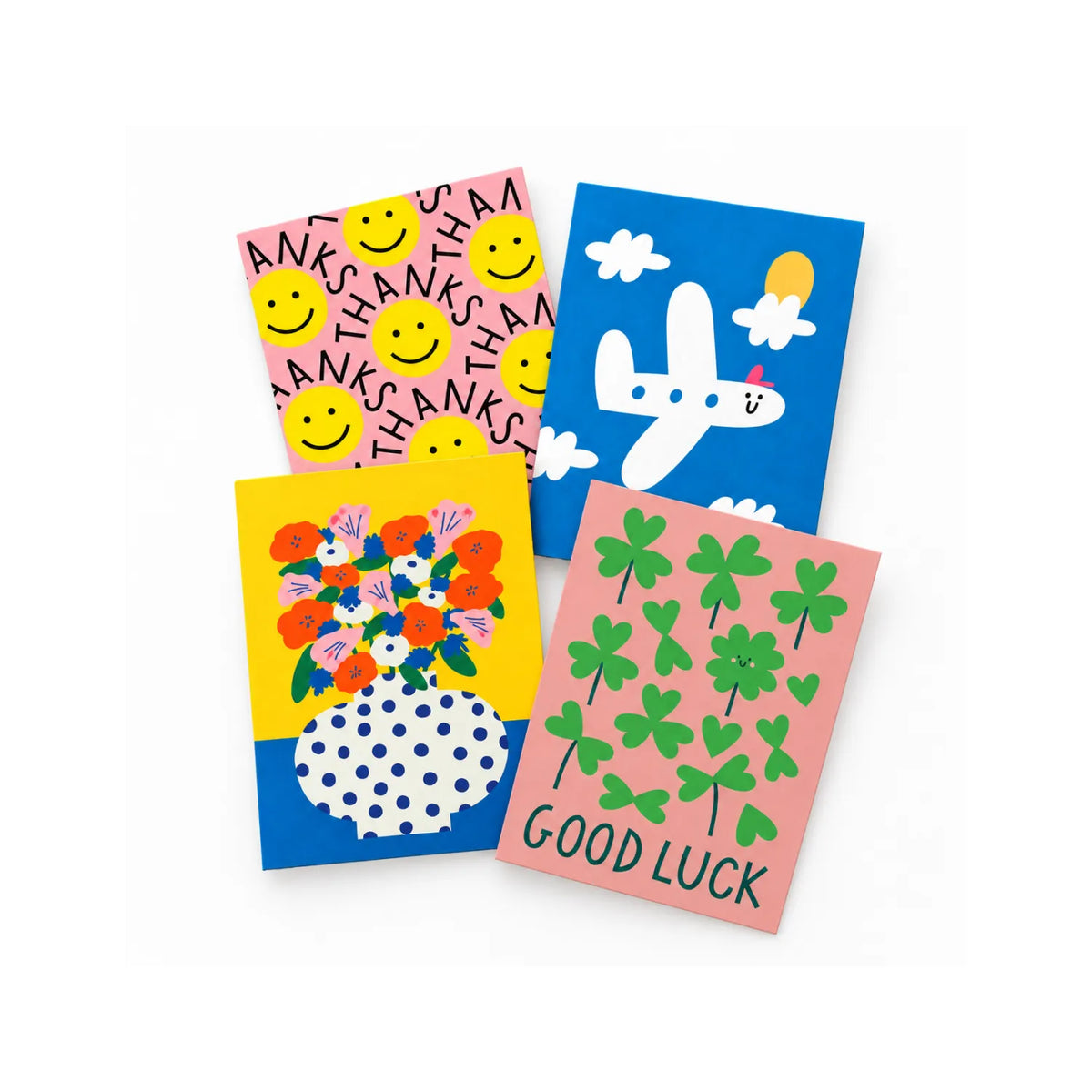 Four illustrated greeting cards in Thanks, New Journey, Sunny Blooms and Good Luck designs, arranged on white