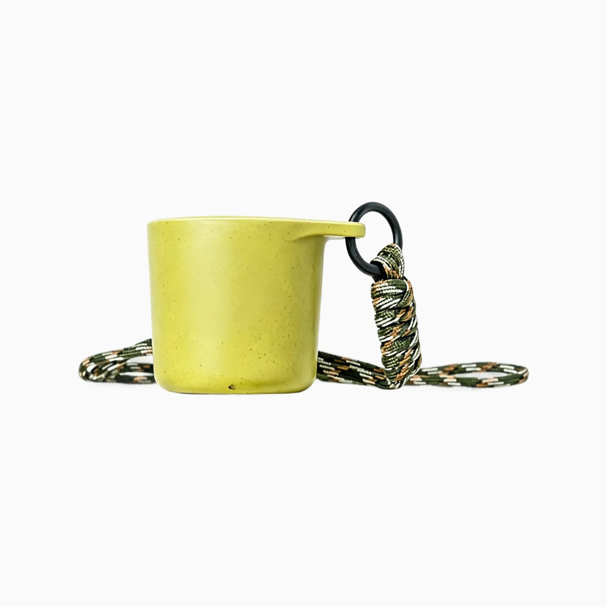 Pear green water drop recycled coffee grounds tasting cup on a white background with a camouflage braided lanyard, speckled finish, no branding applied
