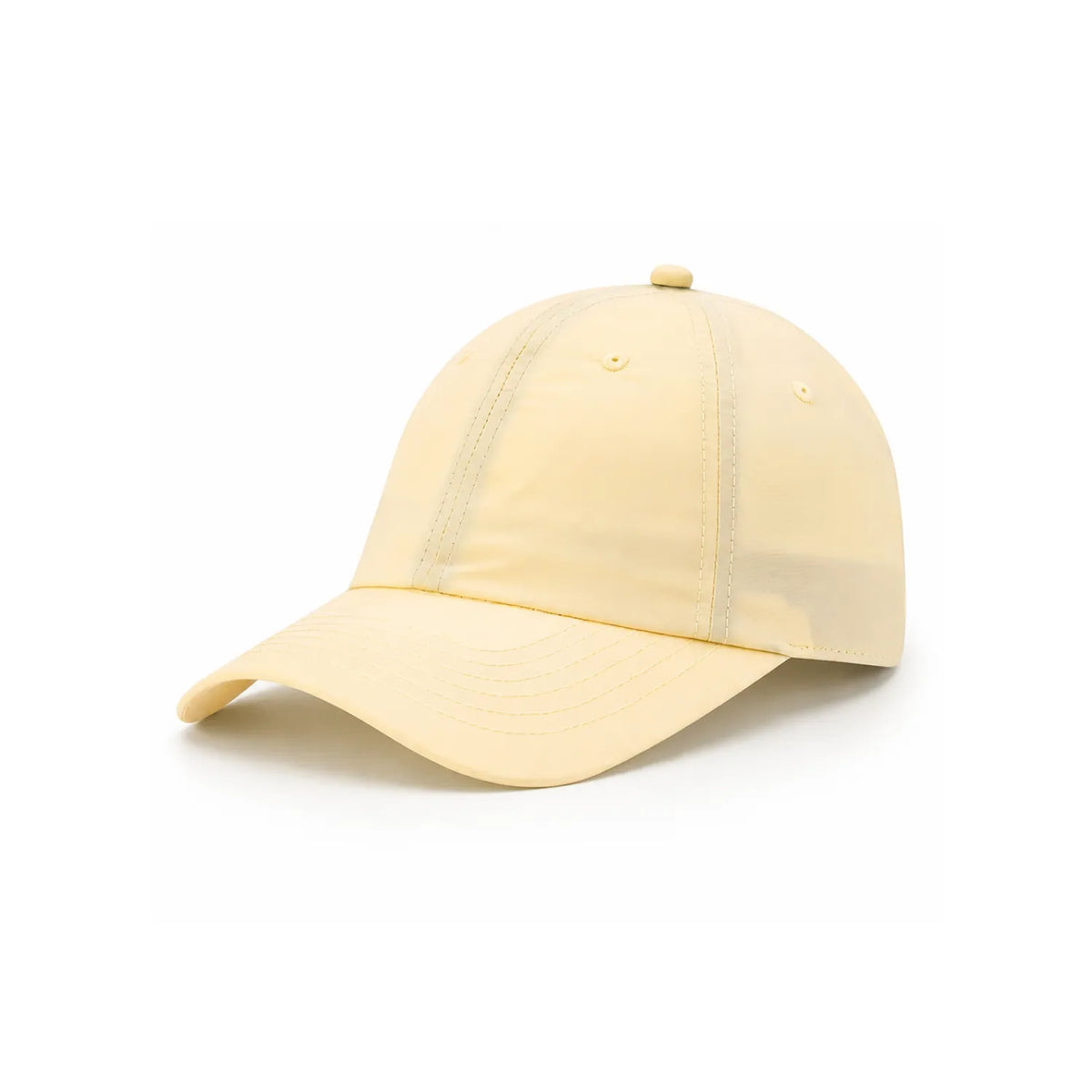 A light butter yellow waterproof lightweight nylon cap with a curved brim, photographed on a clean white background.