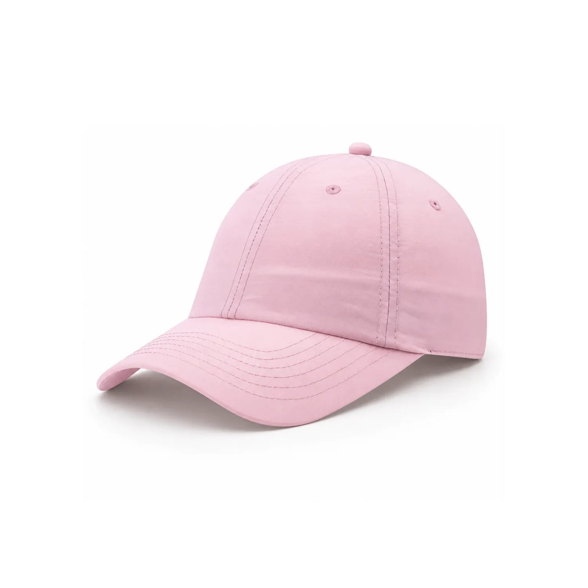 A soft pink waterproof lightweight nylon cap with a curved brim, photographed from a three-quarters angle on a clean white background.