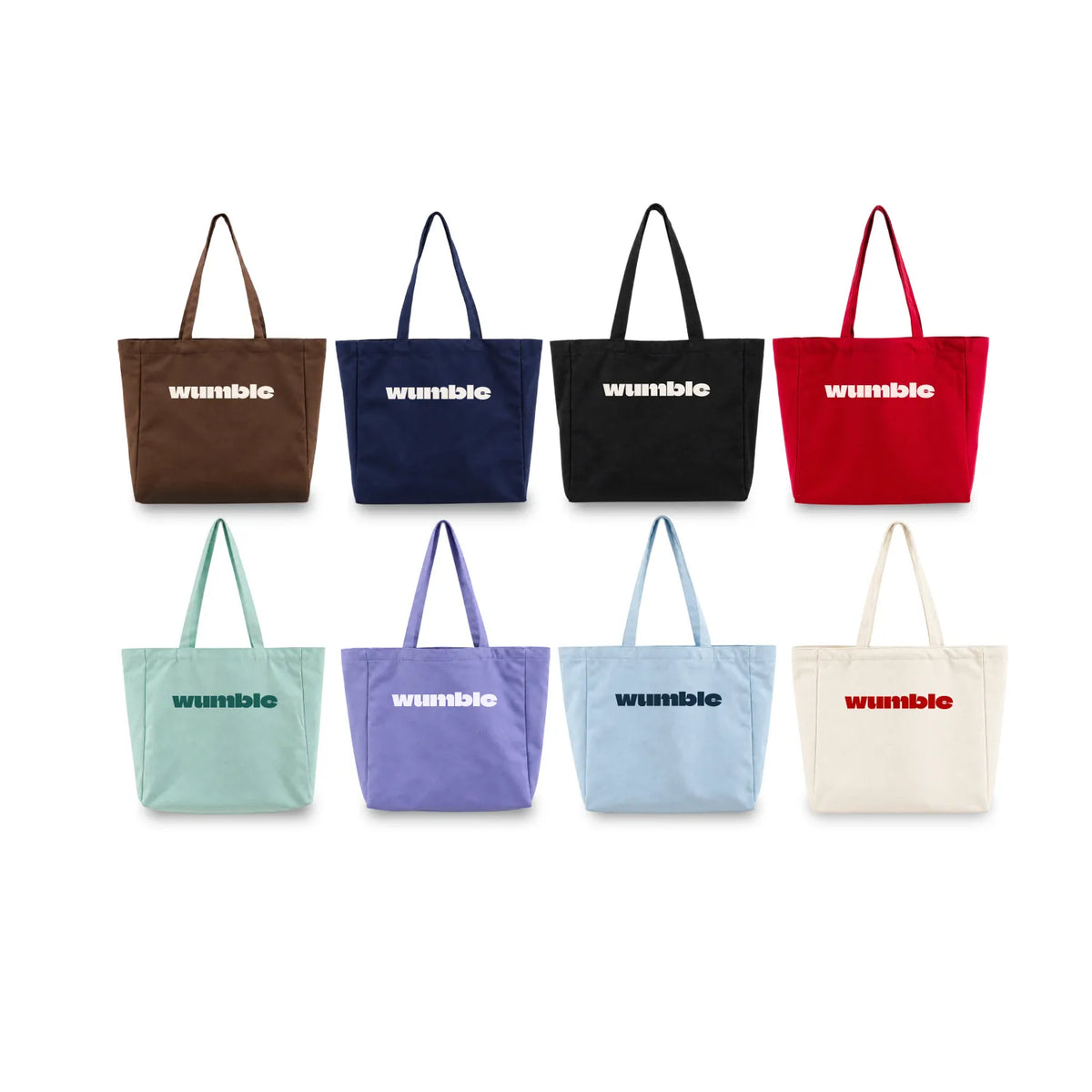 Eight canvas tote bags in different colors are arranged in two rows on a plain white background. Each bag has the customised logo examples of 'wumble' printed on the front in a contrasting colour.