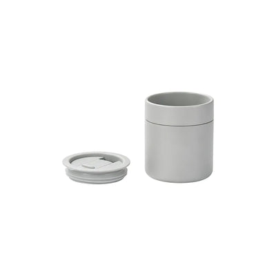 360ml light grey ceramic coffee cup side with silicone lid in light in a white background