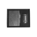 A5 Tyvek notebook, stone pen and black stainless steel insulated bottle in black magnetic gift box with foam insert, viewed from above, no branding applied