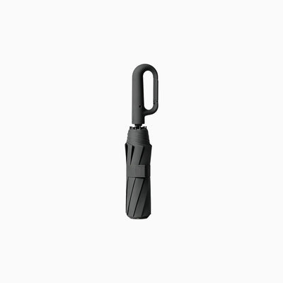 Carabiner handle folding umbrellas in cream white, black and mist blue, custom branded bulk merch by Wumble Merch Australia
