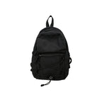 Black compact nylon outdoor daypack on a white background showing the front bungee cord, zip front pocket and twin shoulder straps, no Wumble branding applied