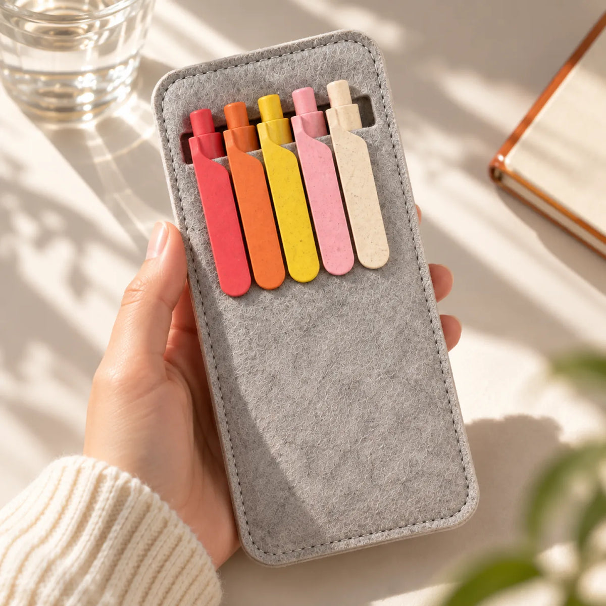 Eco-Friendly Wheat Straw Gel Pen & Felt Sleeve Set with five pens clipped into a stitched RPET felt sleeve
