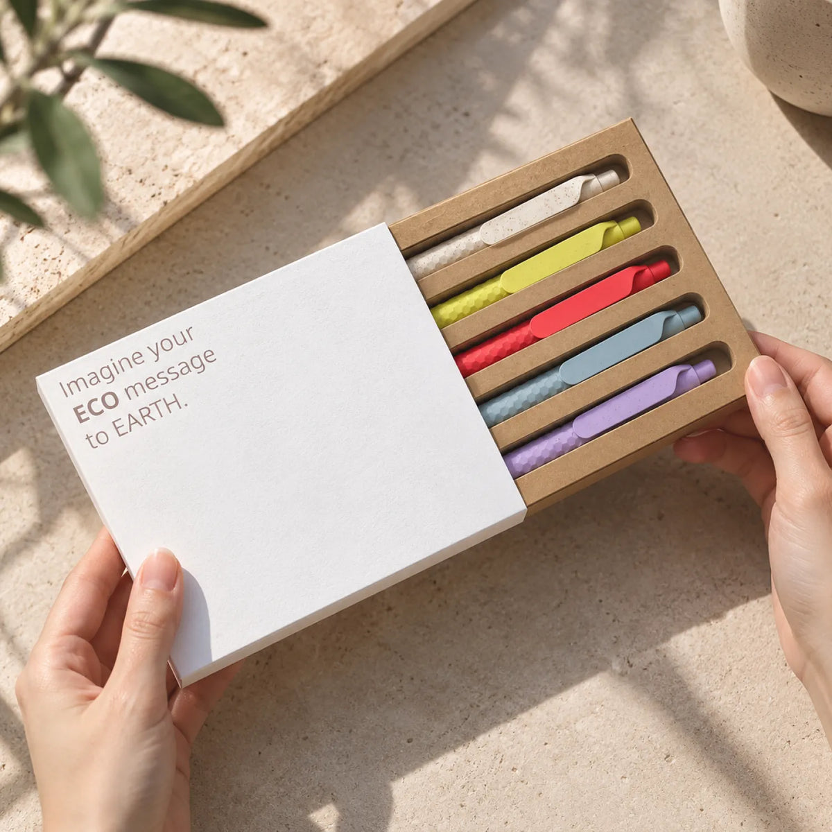 Eco-Friendly Wheat Straw Gel Pen Set with five textured click pens in a kraft corrugated tray
