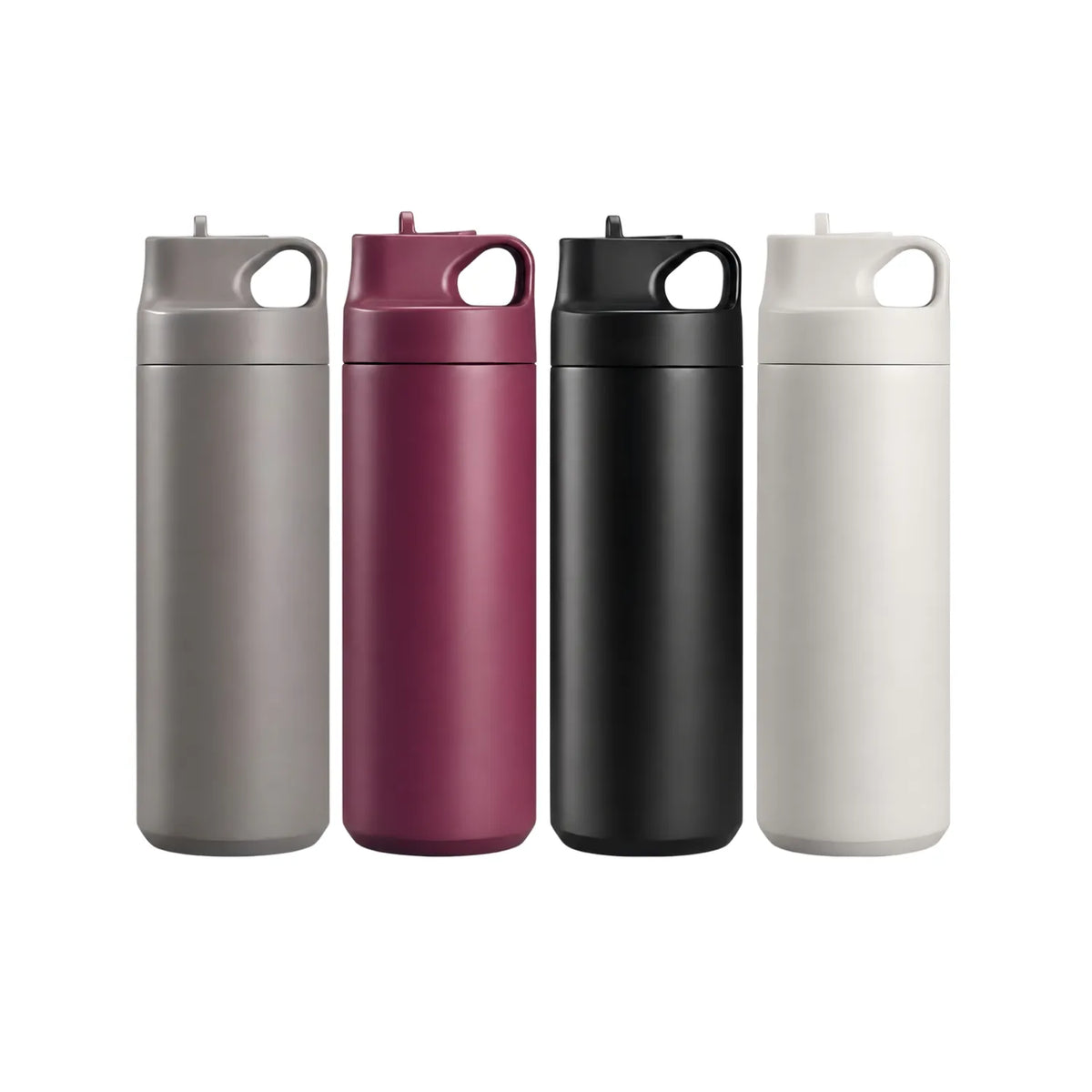 Four drink bottles in grey, burgundy, black and beige grey, lined up on a white background.