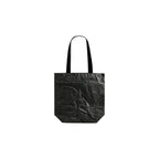Custom branded large Tyvek tote bag in black with mustard yellow cotton handles, bulk eco event bag Australia by Wumble Merch