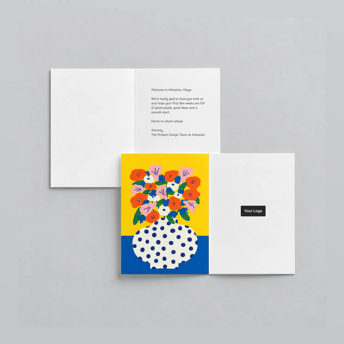 Open illustrated greeting card with a printed welcome message inside and a logo placement on the back, beside the Sunny Blooms front