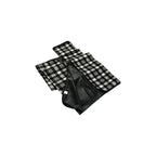 Folded black and white check picnic mat showing the black carry case flap and handle, no Wumble branding applied