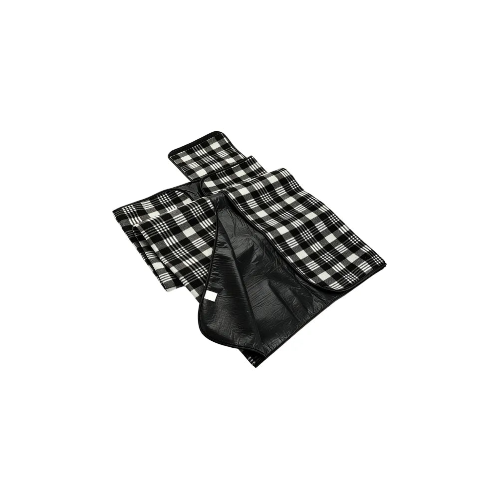 Folded black and white check picnic mat showing the black carry case flap and handle, no Wumble branding applied