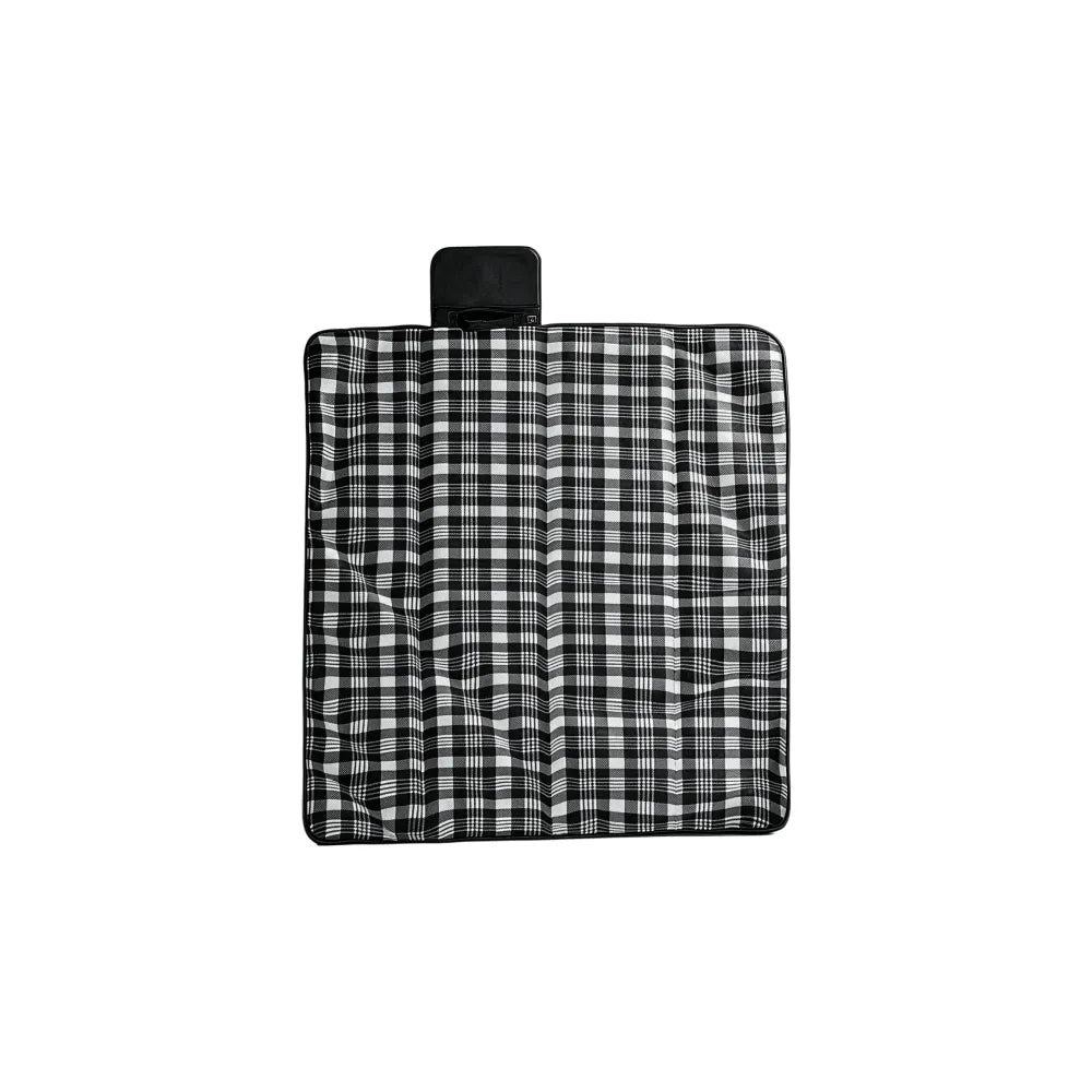Black and white check picnic mat opened flat to show the full surface and bound edges, no Wumble branding applied