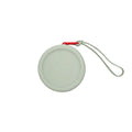 Custom branded round silicone cable pouch in sage grey with orange zipper, bulk tech merch Australia by Wumble