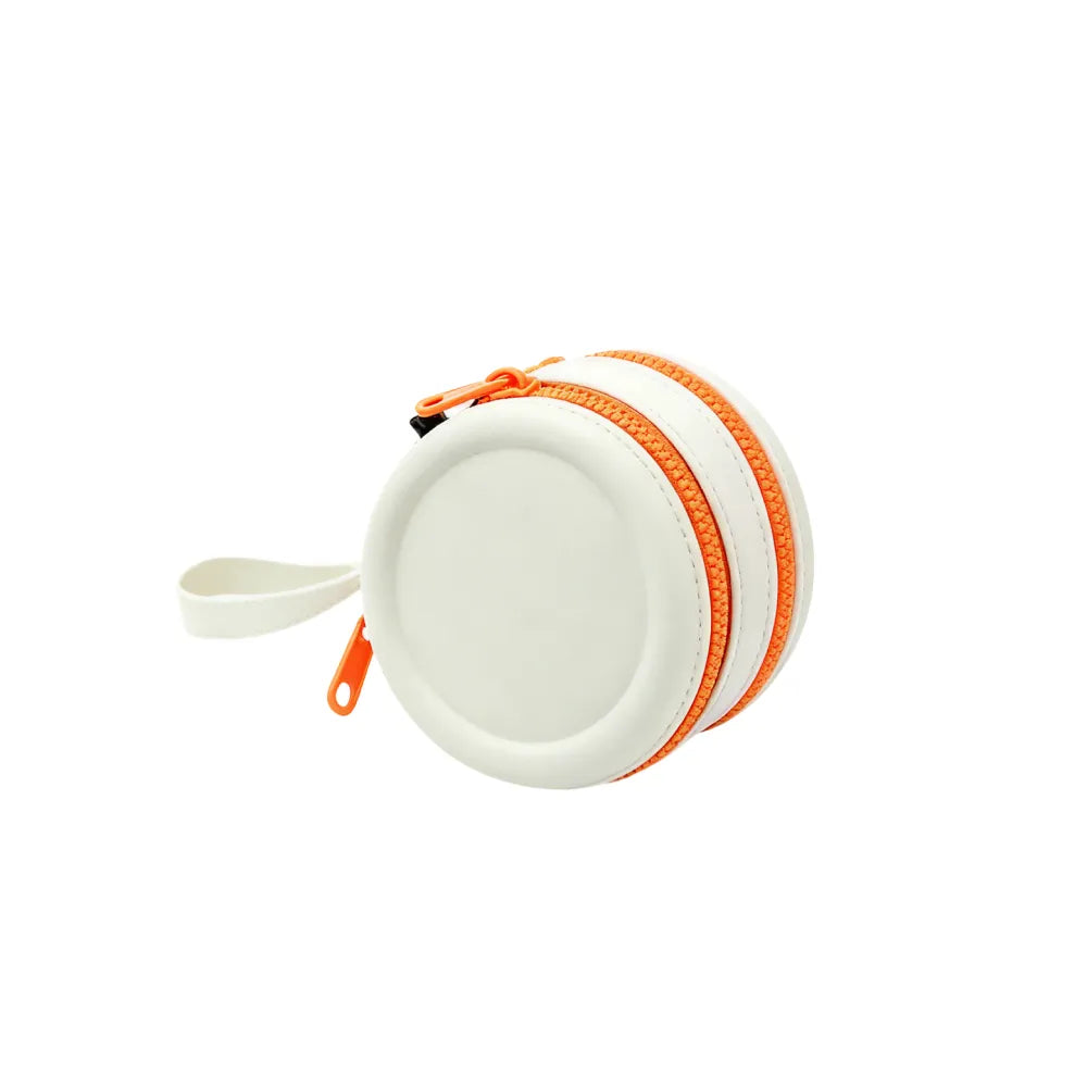Custom branded round silicone cable pouch in white with orange zipper, bulk tech merch Australia by Wumble