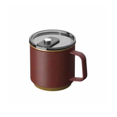 Brick red mug with a squared handle, gold rim and base bands and a clear slide lid with a chrome knob.
