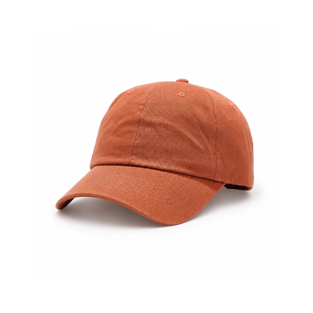 A classic six-panel soft cotton dad cap in a burnt orange, shown from a three-quarters angle on a clean white background.
