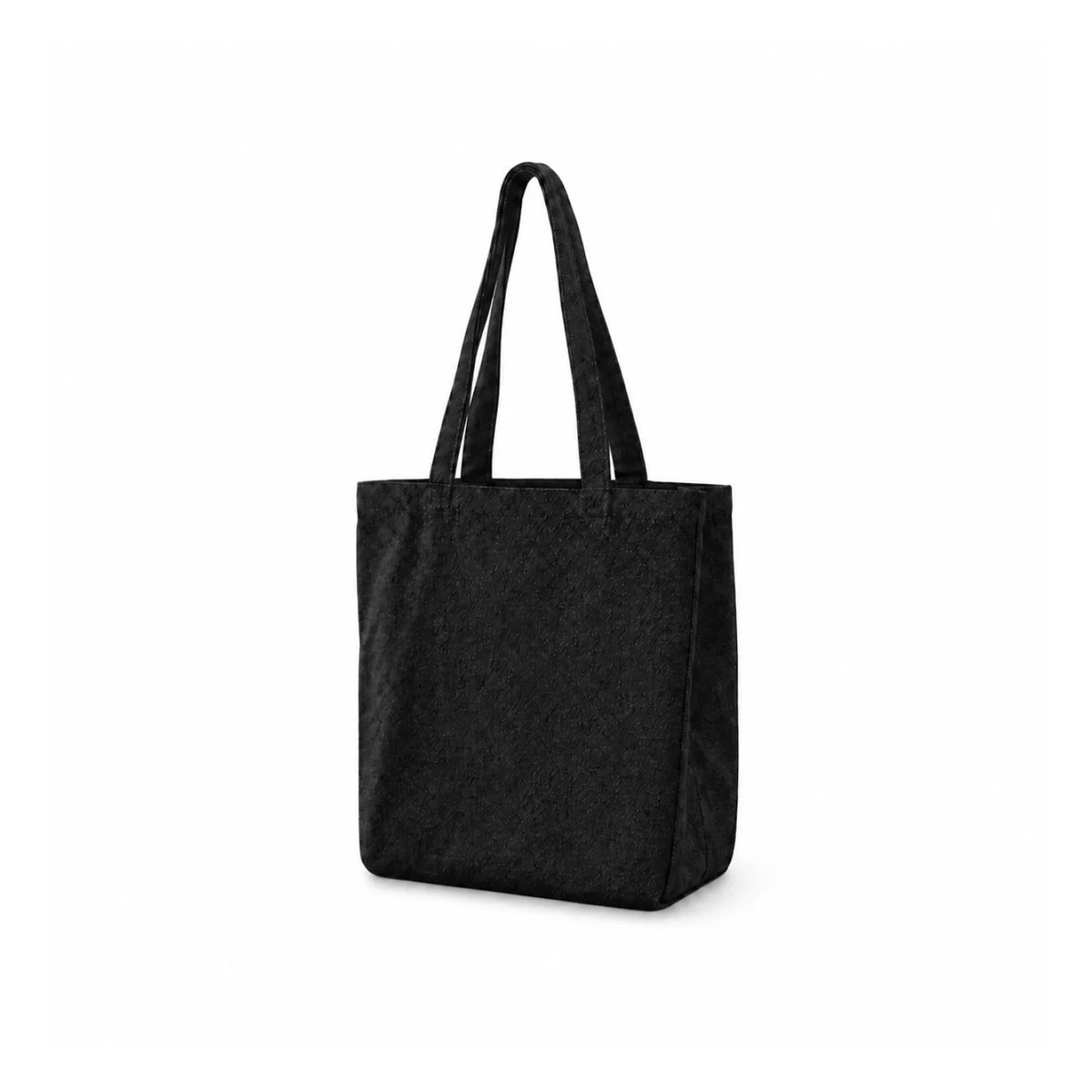 A black denim woven tote bag with two shoulder straps, shown from a three-quarter angle on a solid white background.
