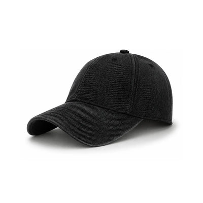 A classic six-panel cotton cap in a washed black fabric, shown from a three-quarter angle on a clean white background.