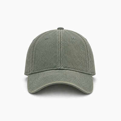 A classic six-panel cotton cap in a washed, faded sage green, shown from a front view angle on a plain background.