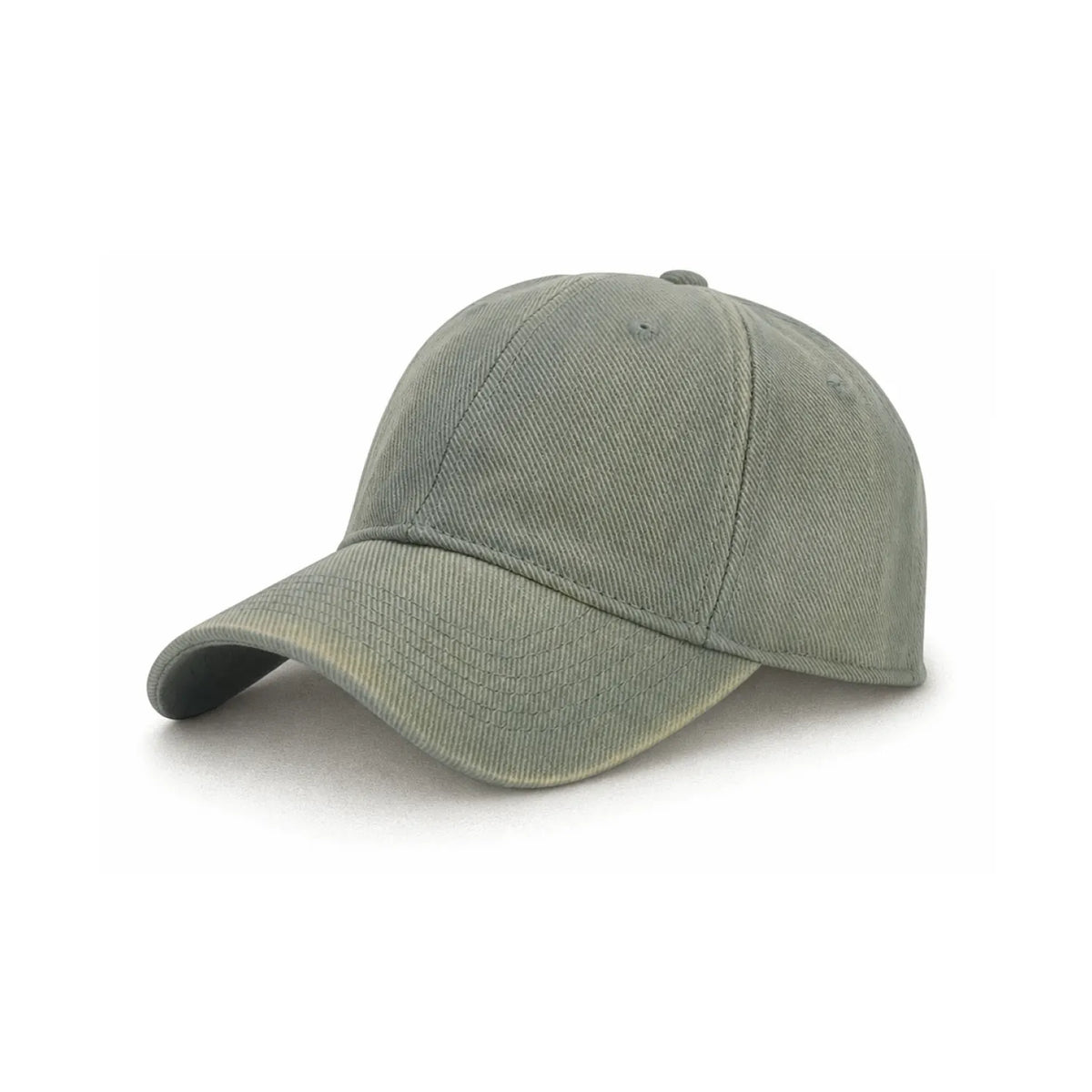 A classic six-panel cotton cap in a washed, retro style sage green colour, shown from a three-quarters angle on a plain white background.