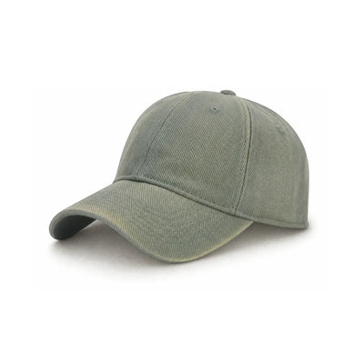 A classic six-panel cotton cap in a washed, retro style sage green colour, shown from a three-quarters angle on a plain white background.