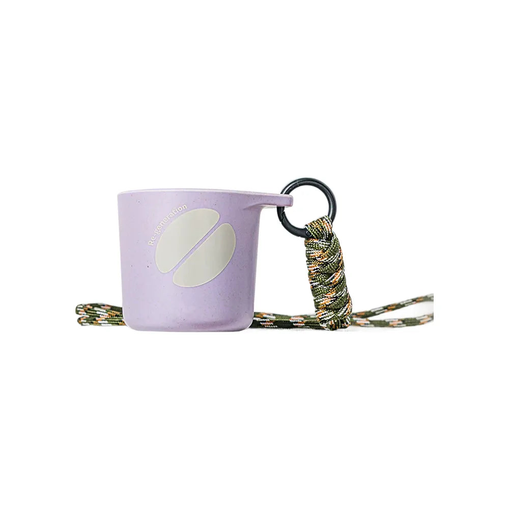 Misty lavender water drop recycled coffee grounds tasting cup printed with a cream coffee bean motif and Re-generation wordmark, camouflage braided lanyard, sample branding example