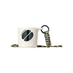 Off-white water drop recycled coffee grounds tasting cup printed with a dark coffee bean motif and Re-generation wordmark, camouflage braided lanyard, sample branding example