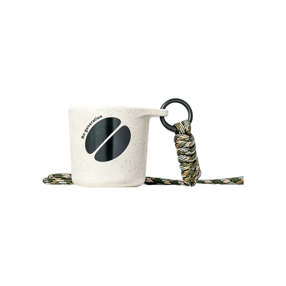 Off-white water drop recycled coffee grounds tasting cup printed with a dark coffee bean motif and Re-generation wordmark, camouflage braided lanyard, sample branding example