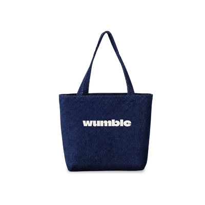 A dark blue denim tote bag with customised logo 'Wumble' printed in white across the front, set against a plain white background.