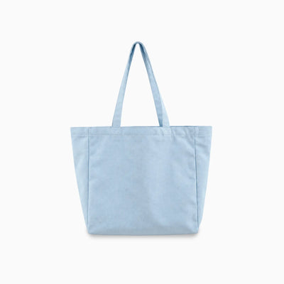 A soft blue canvas tote bag with two shoulder straps, shown against a plain white background.