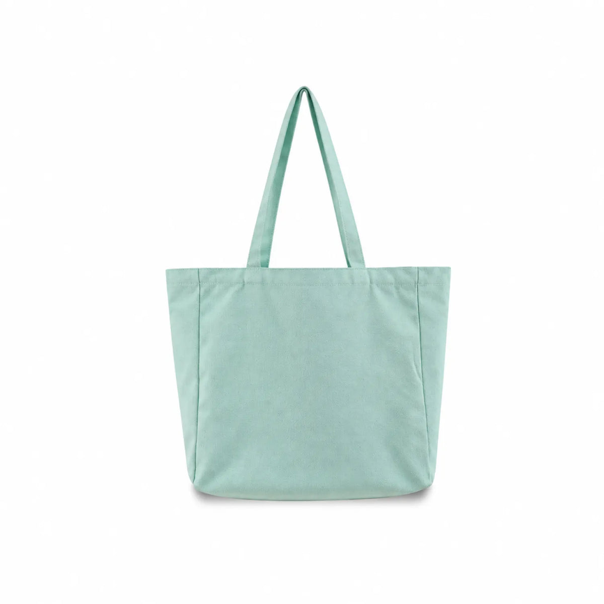 A soft teal green canvas tote bag with two shoulder straps, shown against a plain white background.