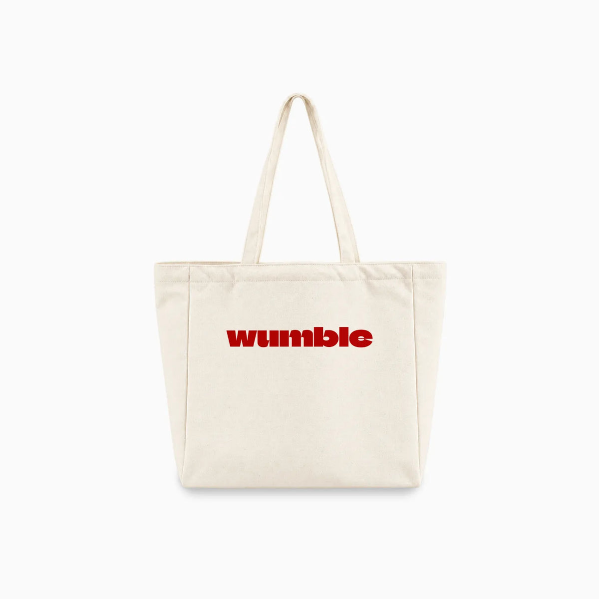 An off-white canvas tote bag with two shoulder straps and customised logo 'Wumble' example printed in red across the front, shown against a plain white background.